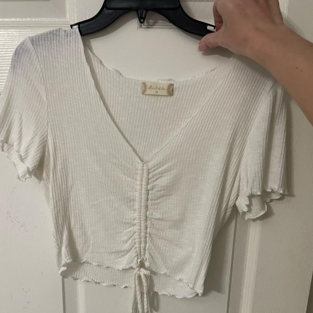 Altered state top with adjustable length